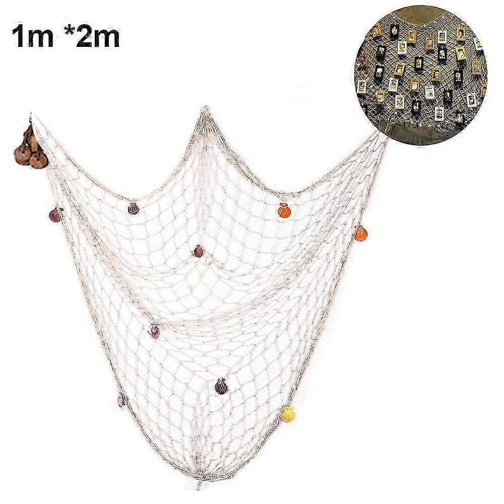 Rustic nautical fishing net wall decor with starfish, lifebuoy, and anchor ornaments