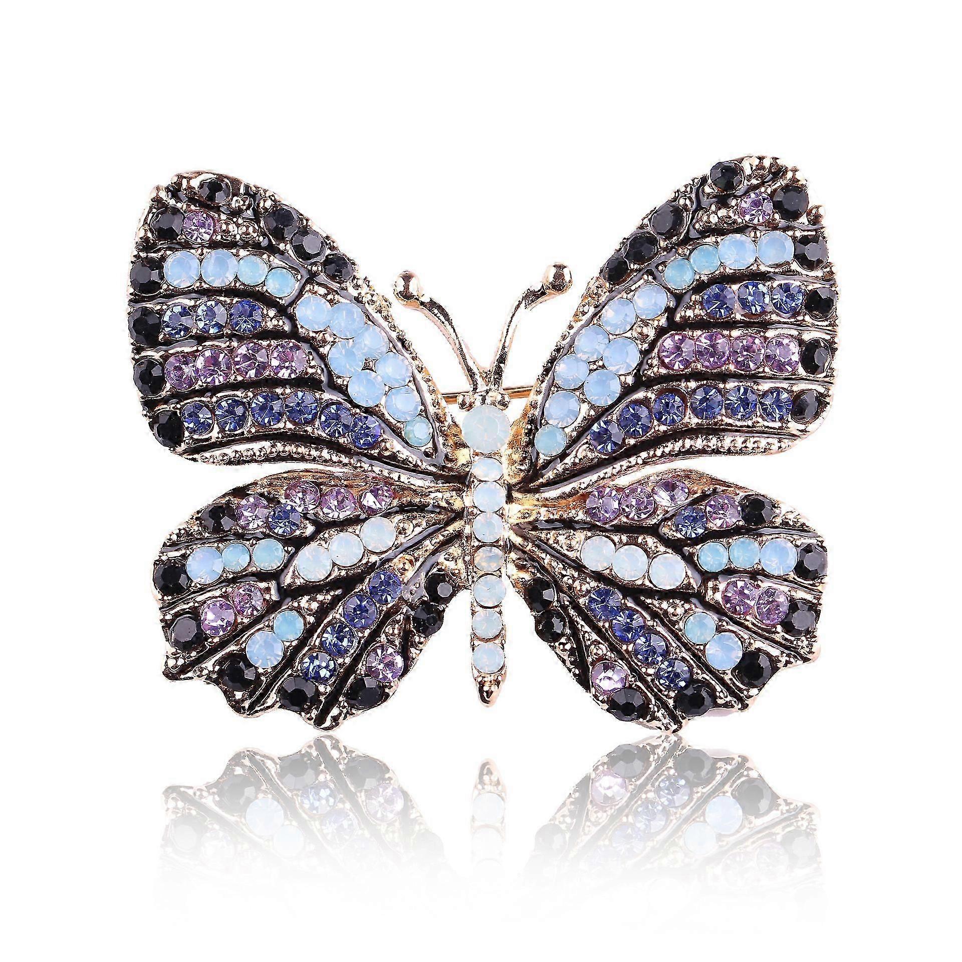 Broche en cristal papillon monarque doré