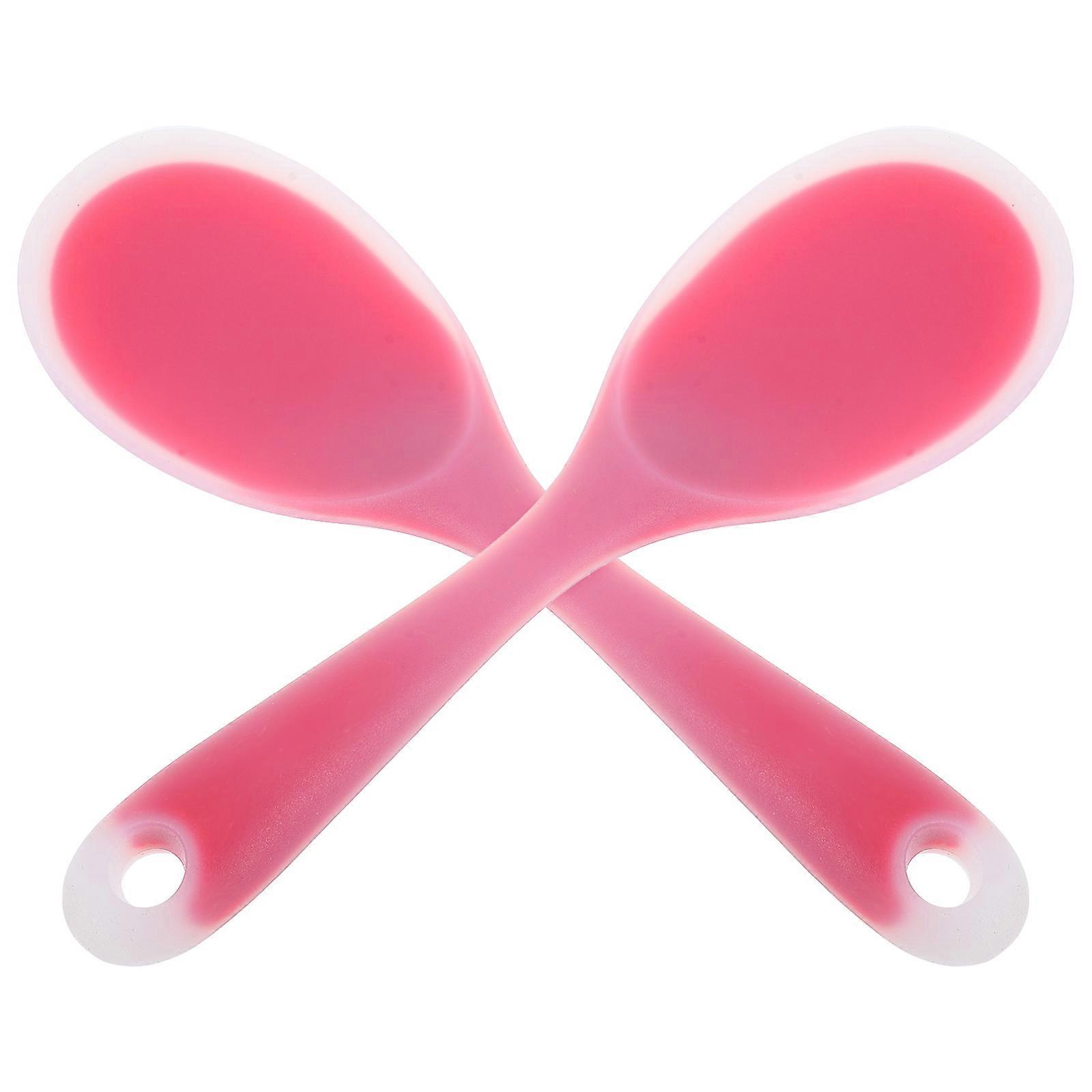 Here's a refined and professional product description based on your input:
 
**2PCS Non Stick Silicone Rice Spoon – Ergonomic Kitchen Utensil for
