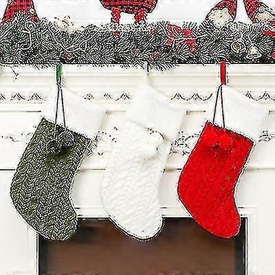 3st stickad julstrumpa med julprydnader