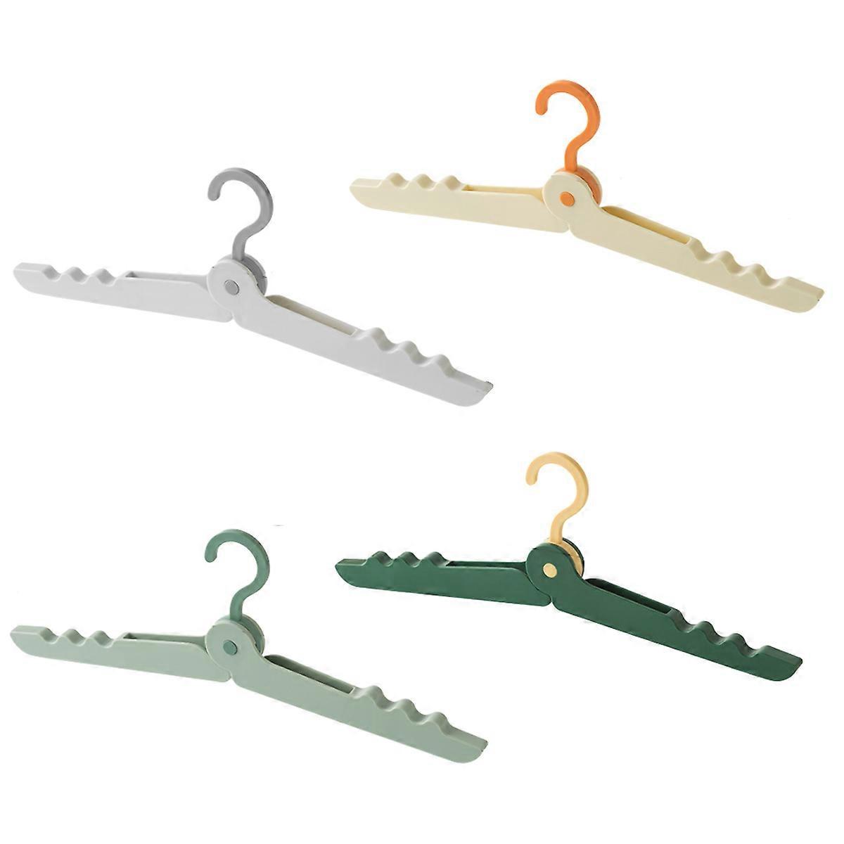 4 Foldable Travel Hangers with Clips for Clothes and Socks.