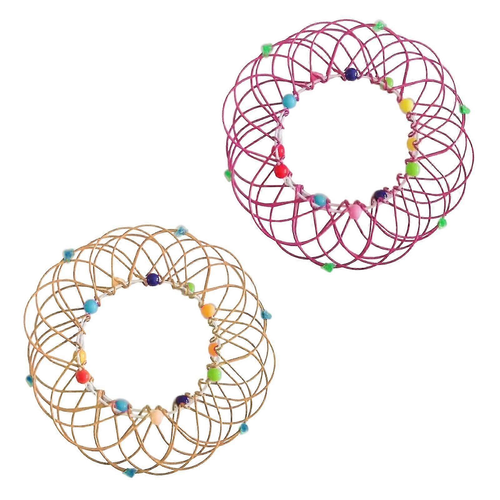 Dekompression Flexibler Korb Weichstahl Magic Eisen Ring Ornament 2pc