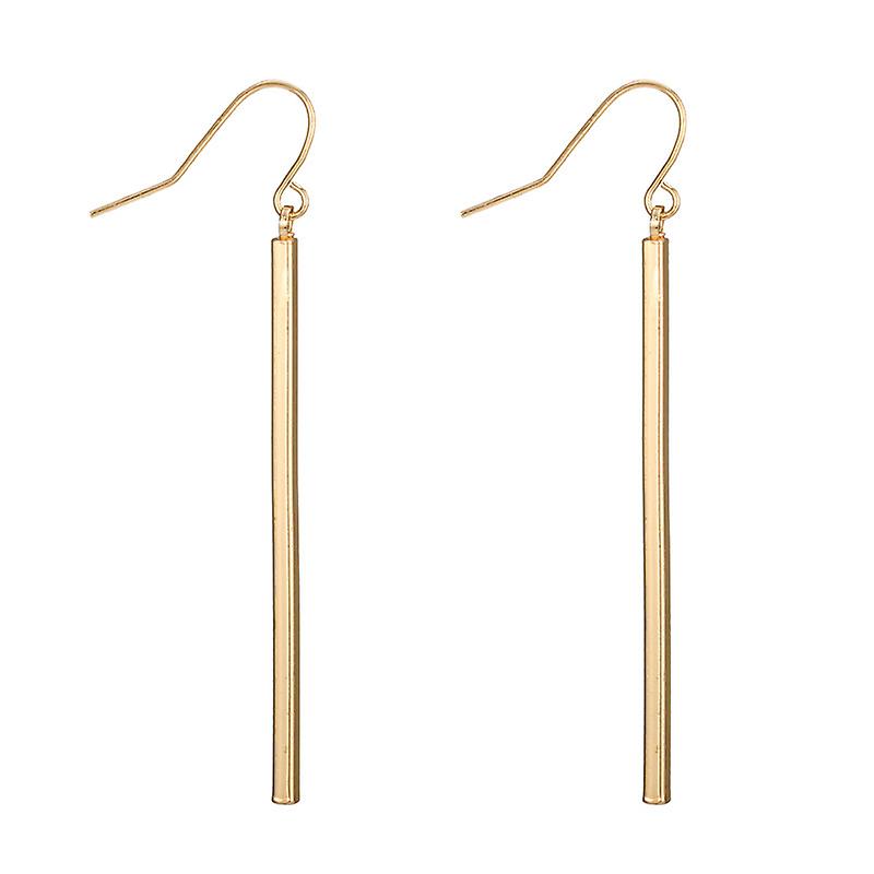 Linear dangling earrings in yellow gold