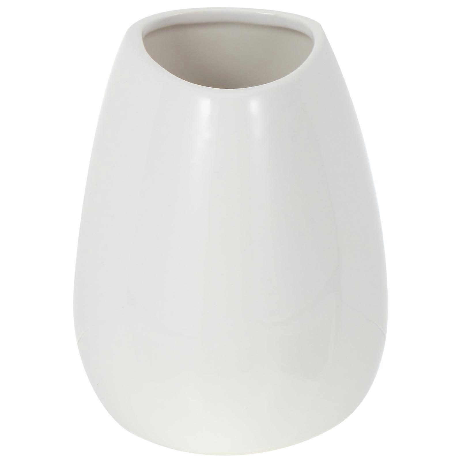 Here's a polished and engaging product description based on your input:
**Ceramic Indoor Bonsai Simulation Plant Pot – Stylish Faux Flower