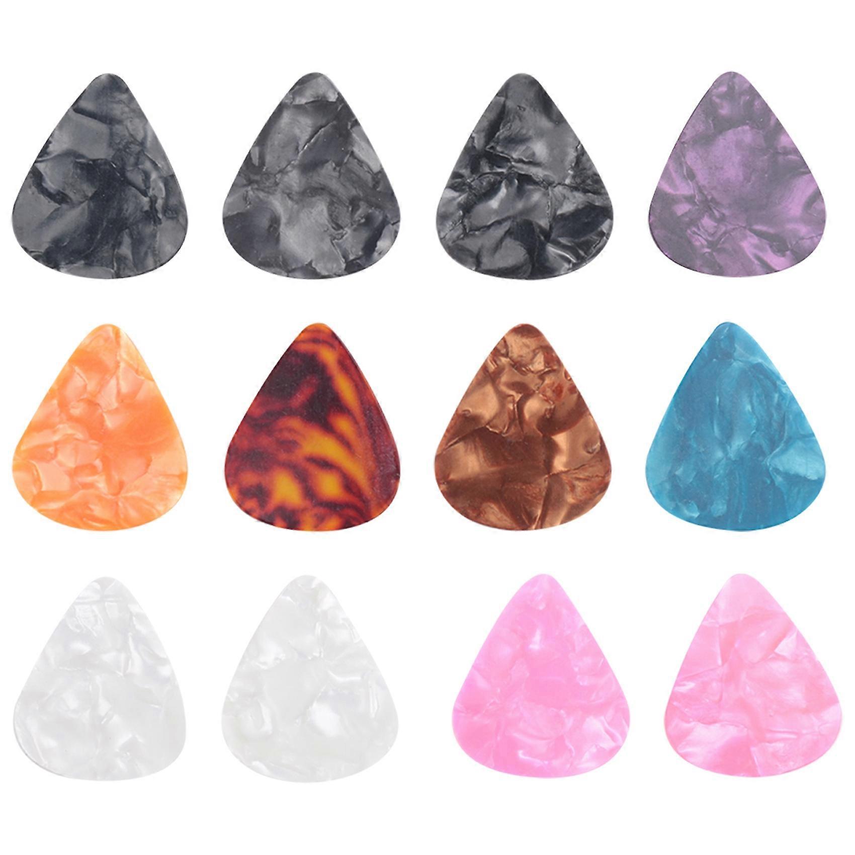 12 x rock picks - Mediators for guitars and basses 3 different thickness