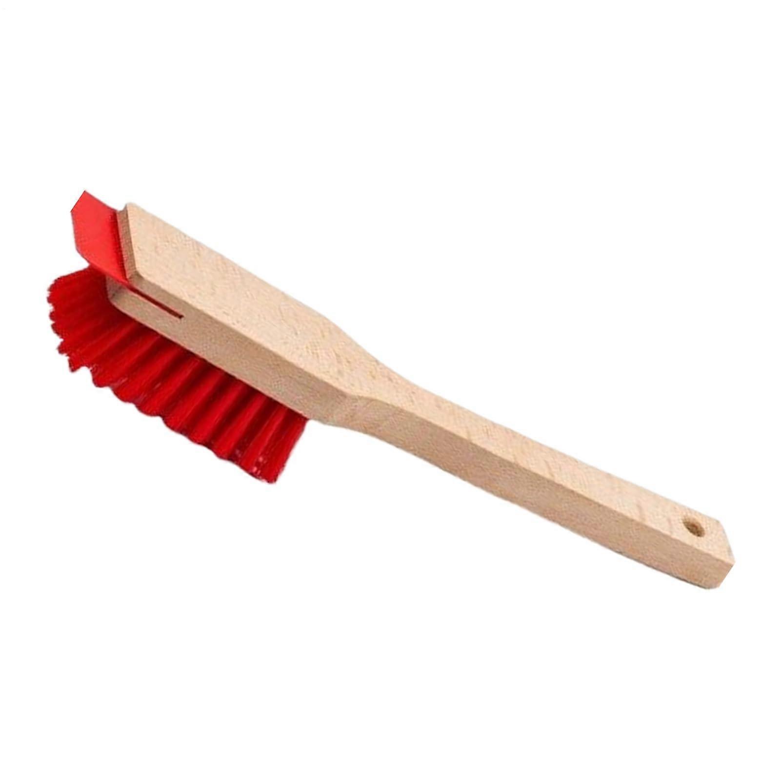 Lawn mower scraper tool with stiff bristles for floor, ceiling, and faux furniture.