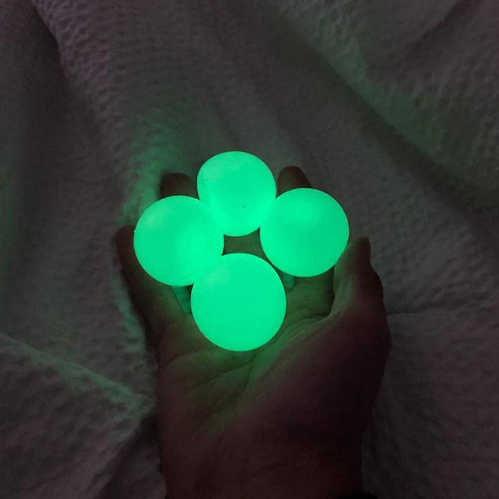 Unbrand 4pcs Squeeze Toys Luminous Sticky Wall Balls Stress Reliever Juguete Adultos Niños Color aleatorio