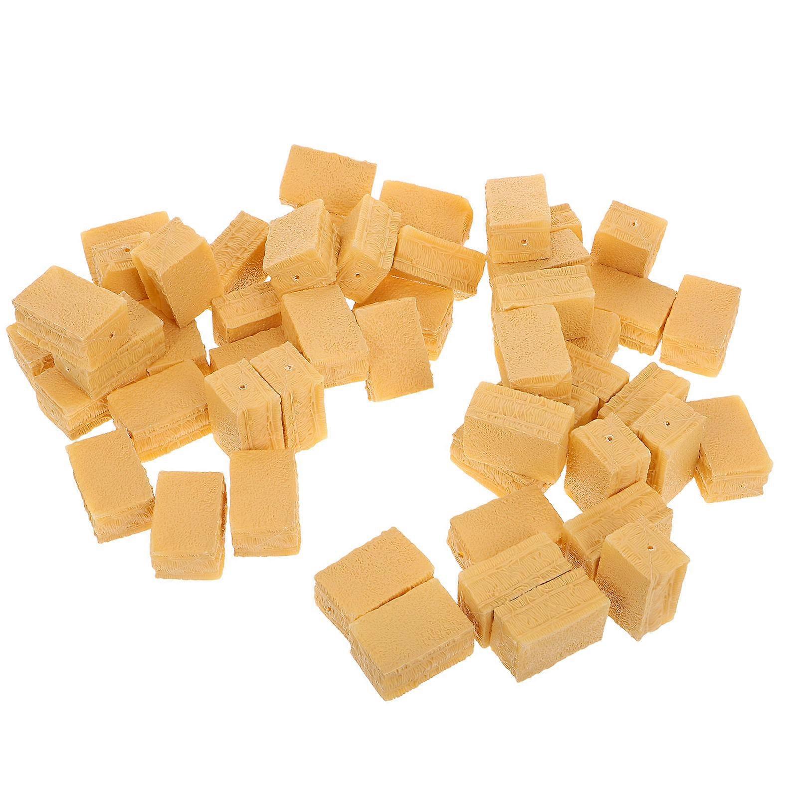 It looks like you're referring to a product listing for **miniature artificial hay bales** or **straw bales** often used in **dollhouse decor**,