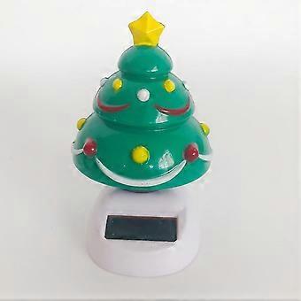 Twee dansende figuren op zonne-energie, huishoudelijke auto's en kinderspeelgoed kerstbomen