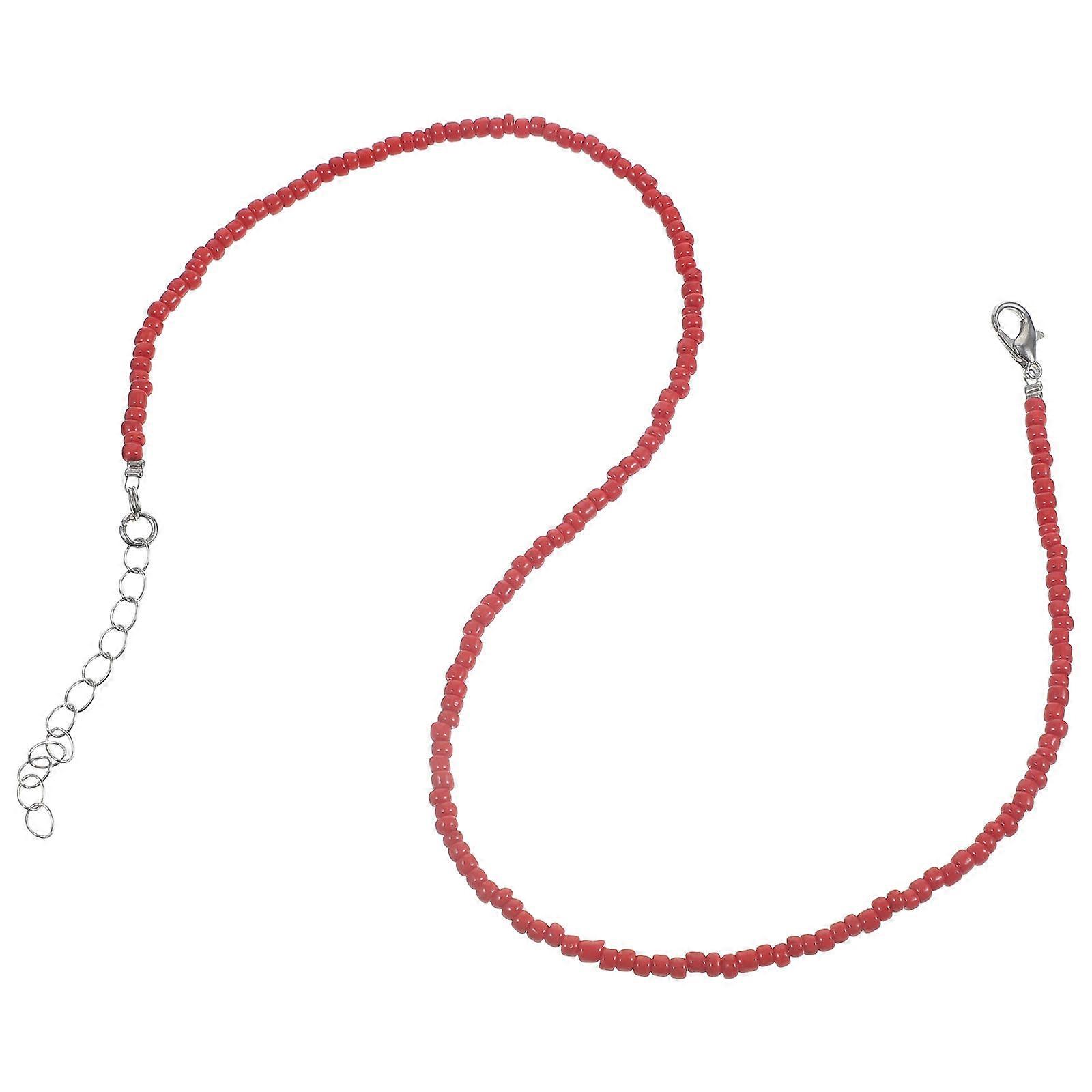 Hier ist eine ausgefeilte Produktbeschreibung für deine **Bunte Reisperlenkette**:
**Bunte Reisperlenkette – Rotes einlagiges Halsband | Stilvoll