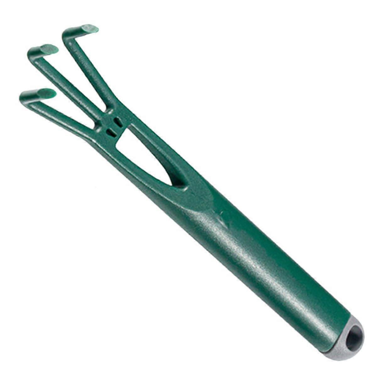 Large plastic rake for gardening to loosen planting accessories for garden work and bed maintenance. Sturdy garden tool for efficient work.