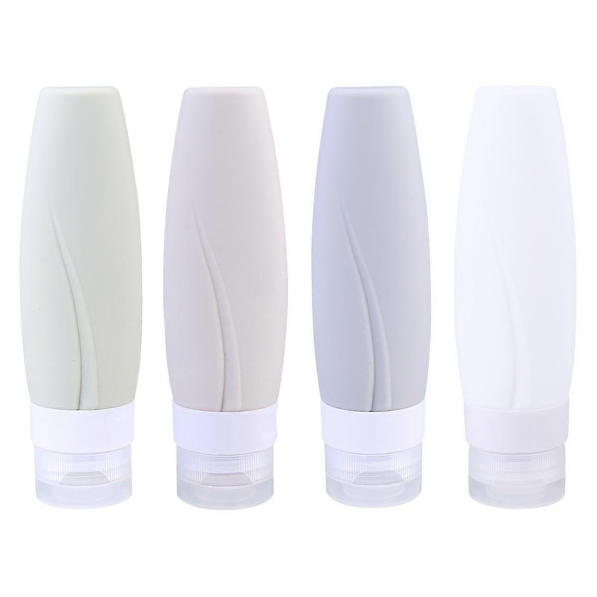 4 Pack Silicone Travel Bottles - Reusable Squeeze Containers for Shampoo, Lotion, and Liquid Soap - Eco-Friendly