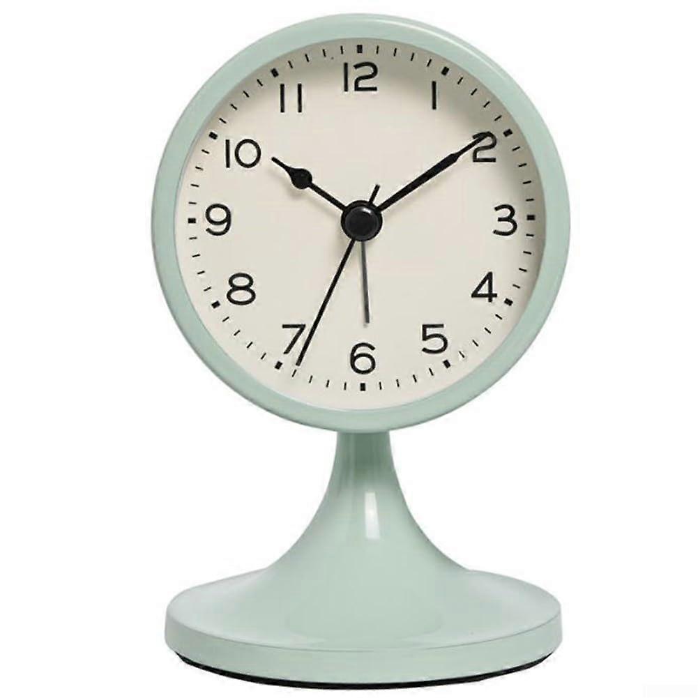 Charming vintage metal desk clock for kids, with a silent alarm and glowing features for lowlight conditions (green).