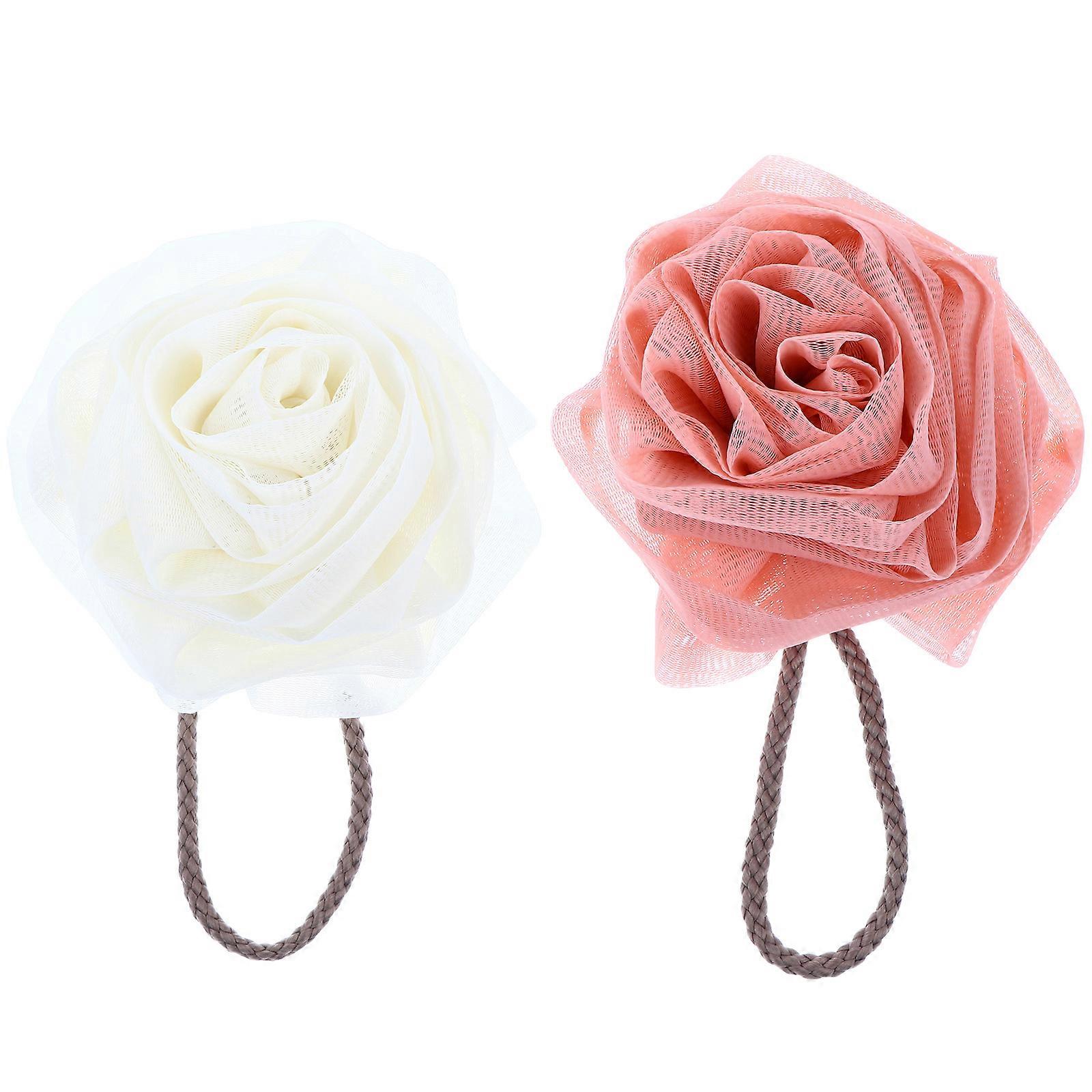 Here's a refined and engaging product description based on the details you provided:
**2 Pack Flower Shaped Shower Puff Mesh Bath Balls –