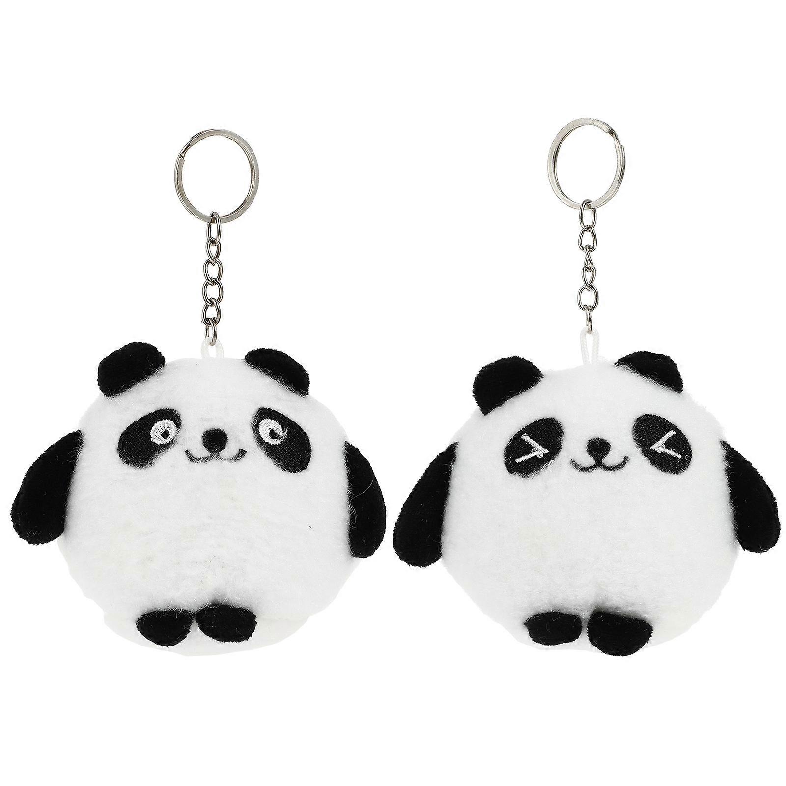 a refined and engaging product description based on your input:
 
**2pcs Adorable Plush Panda Keychain Soft Cartoon Panda Stuffed Doll
