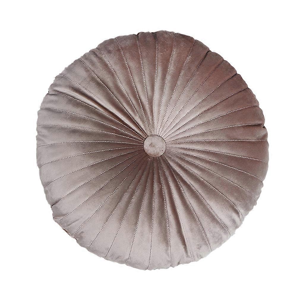 Dekorativ fløyelspute og gresskarputepute er egnet for sovesofagulv i stuen.