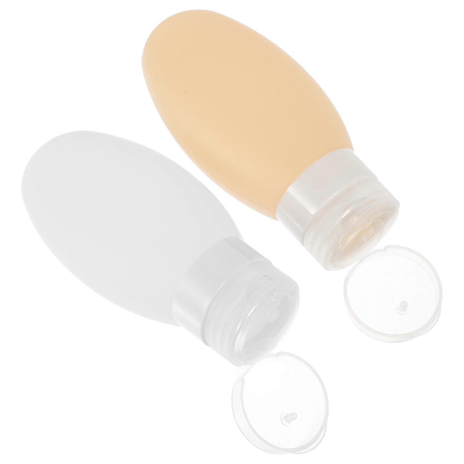 Silicone Travel Bottles with Suction Cups   Leak Proof Squeezable Containers for Toiletries, Body Lotions, and Liquid Soaps