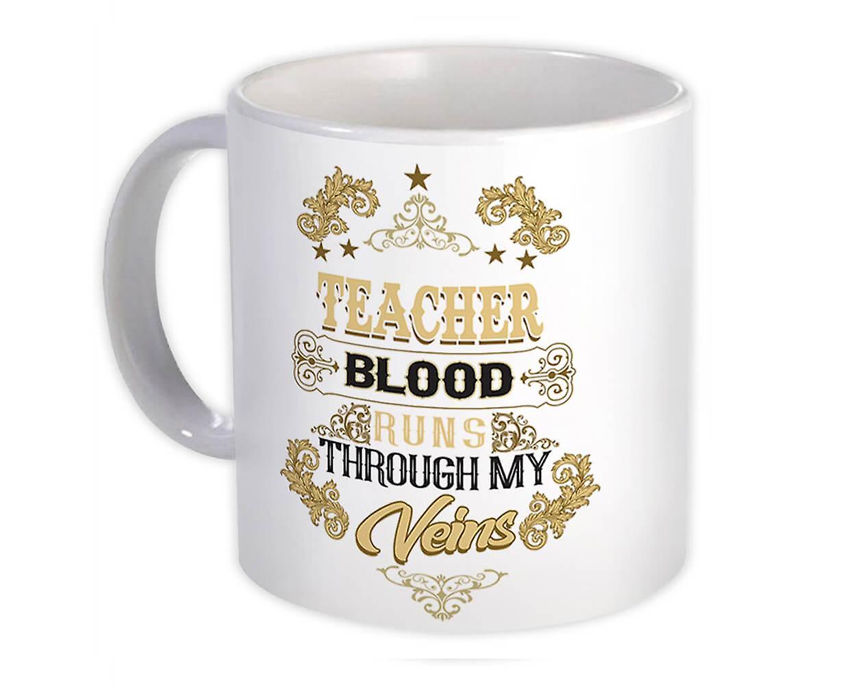Presentmugg: LÄRARBLOD rinner genom mitt ådror kontor
