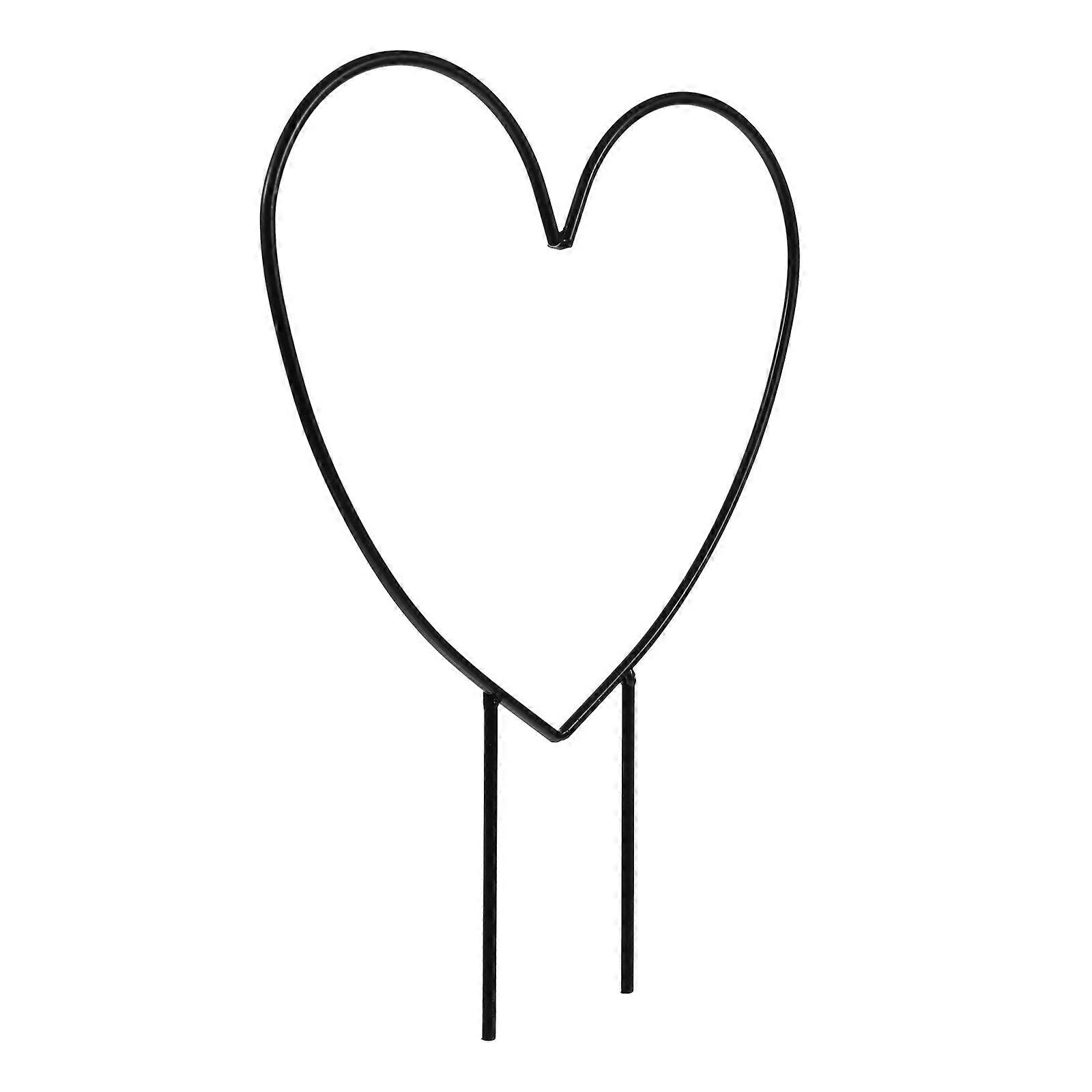 The **Heart Shaped Plant Trellis** is a charming and functional garden accessory designed to support climbing plants while adding a decorative touch