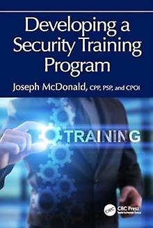 Developing A Security Training Program by Joseph McDonald Paperback