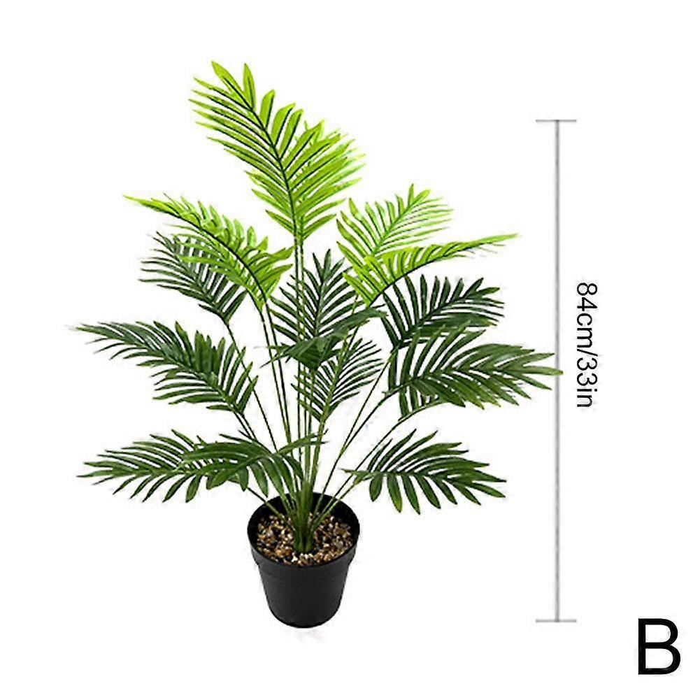 大きい人工的なヤシの木背の高い偽の植物熱帯プラスチックは家の装飾を去る