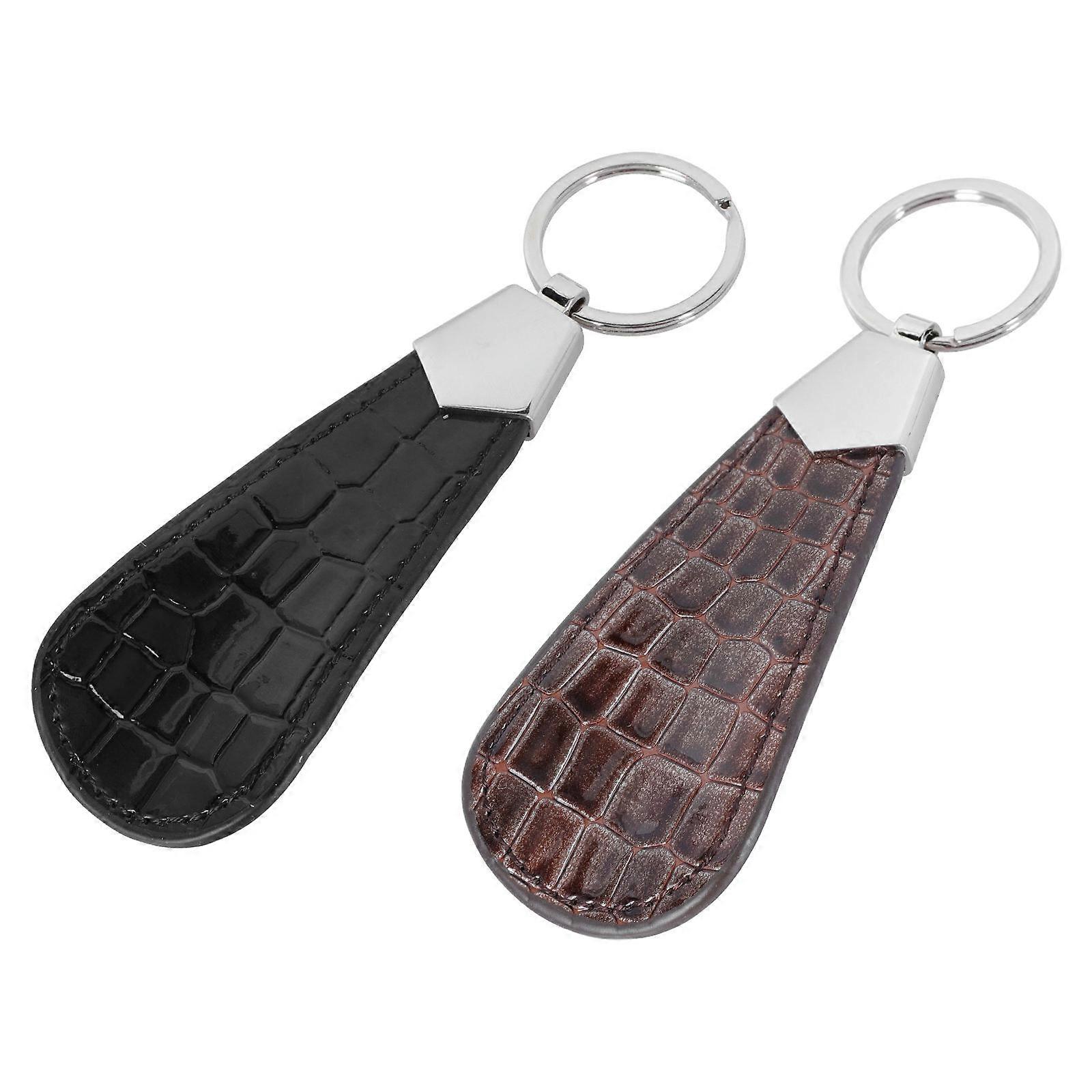 Here's a polished and professional product description based on your input:
**2PCS PU Shoehorns with Key Ring – Portable, Multi Use Shoe