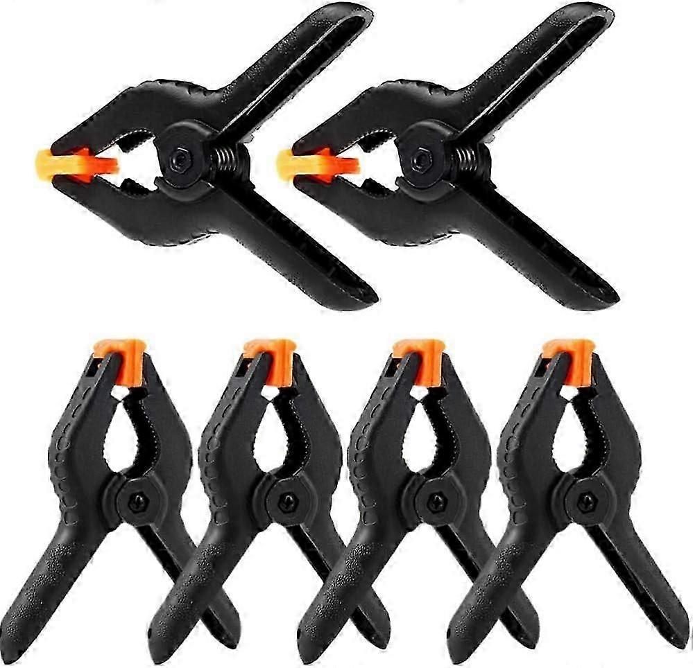 Heavy-duty plastic spring clips with quick-release clamps.