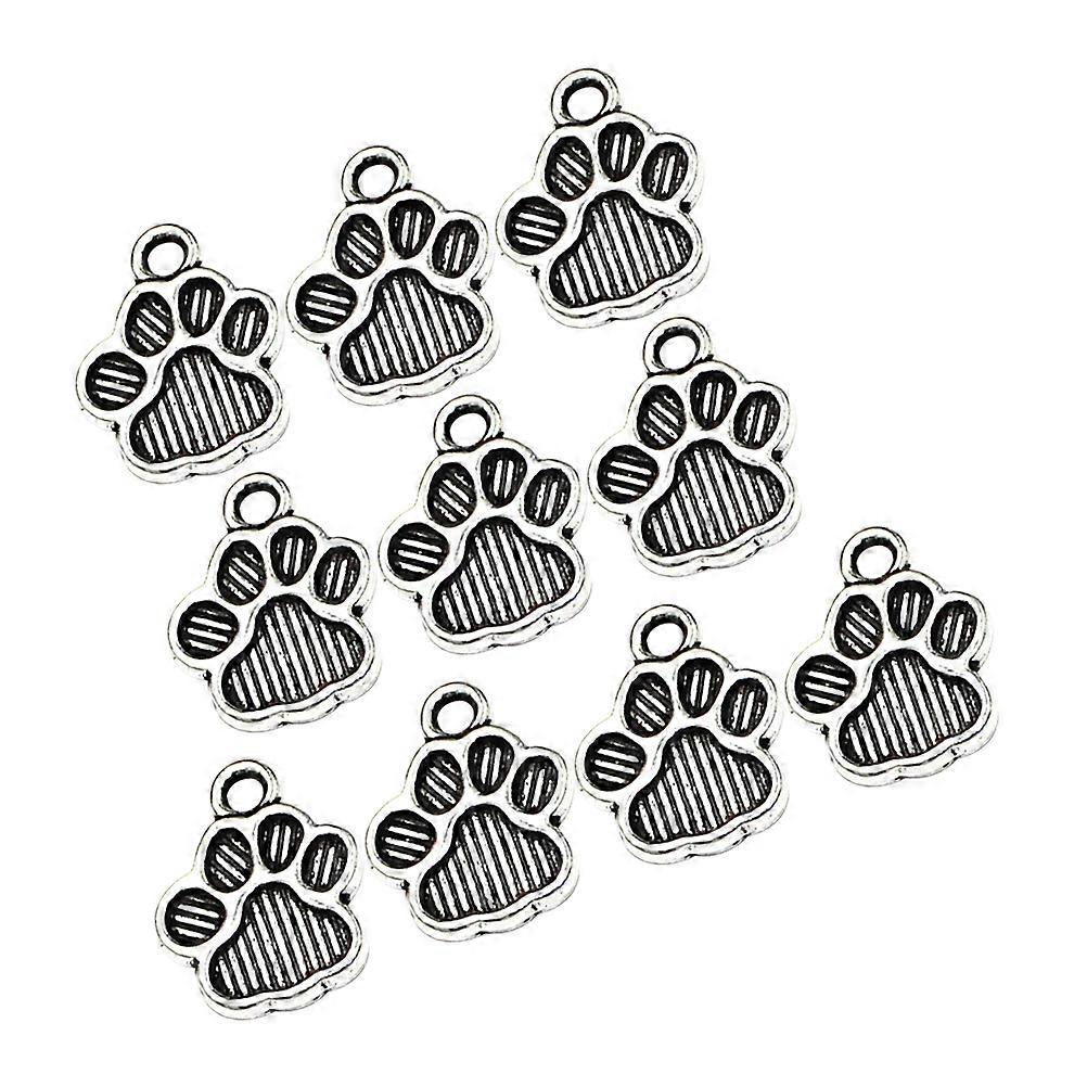 ヴィンテージシルバー犬足プリントチャームブレスレット、ネックレス、スクラップブッキング、キーホルダー、ペットフットプリントジュエリーアクセサリー用100個DIYペンダント