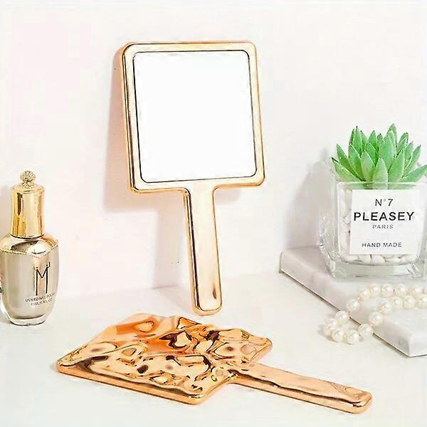 Handheld makeup mirror, compact and portable, with a water ripple design