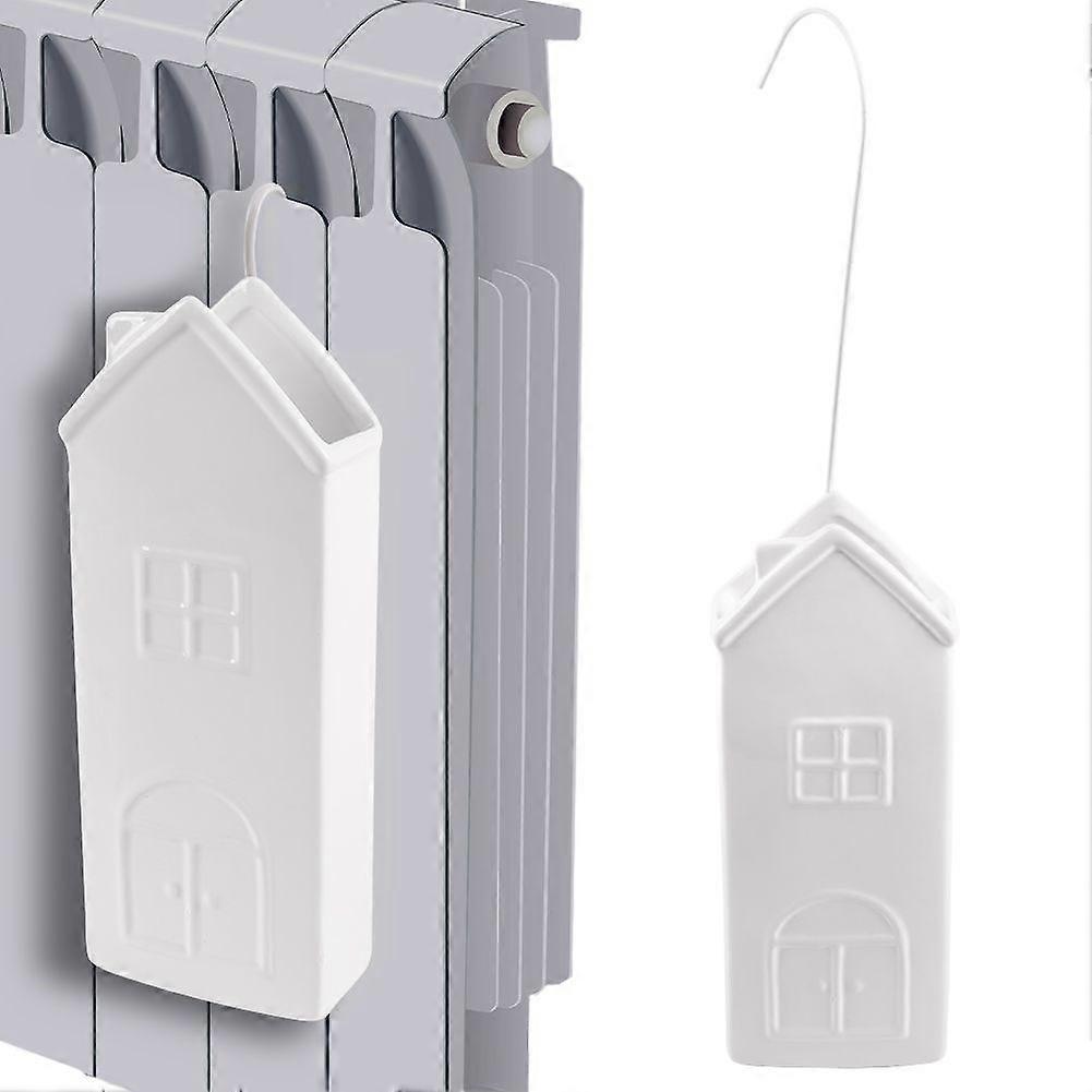 Ceramic Humidifier with House Motif for Dry Winter Days