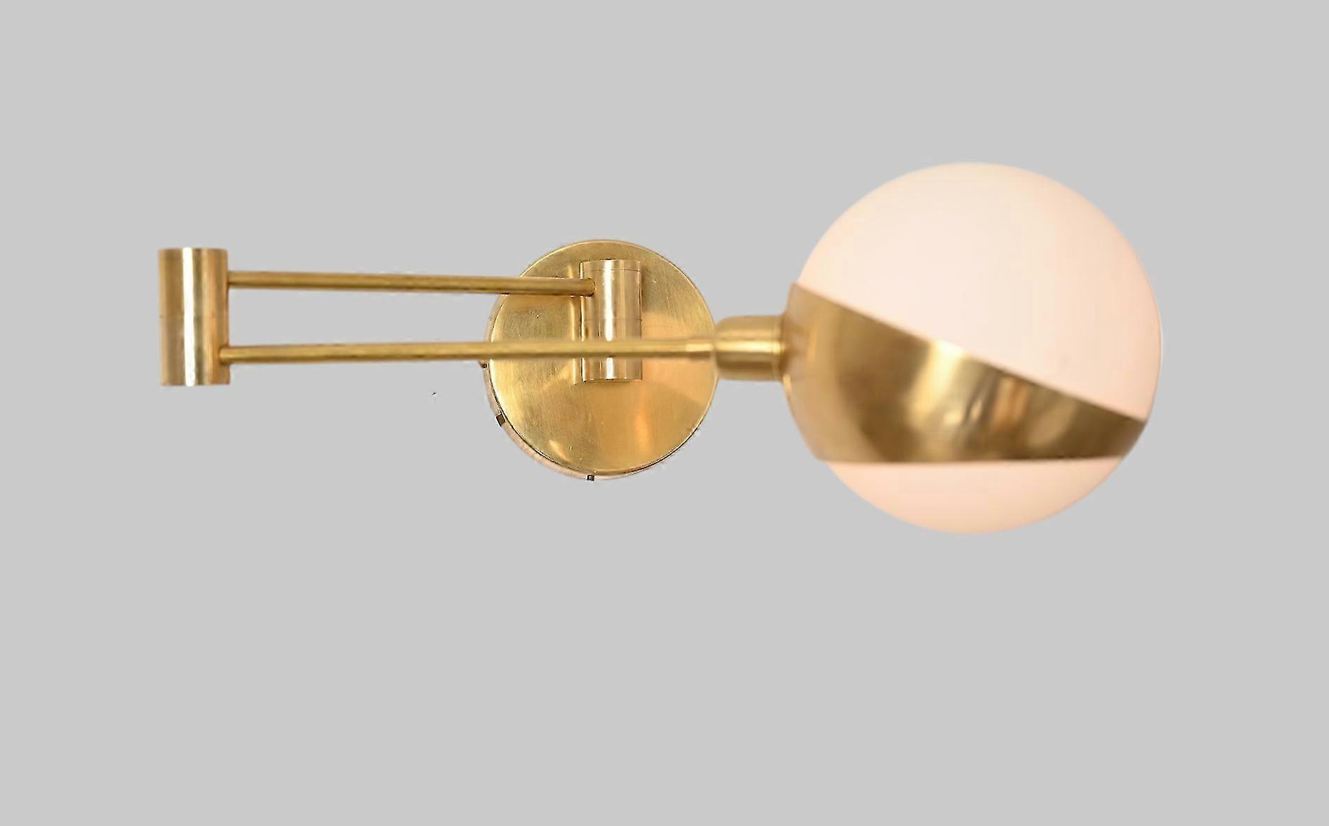 Adjustable Brass Globe Sconce – Vintage Charm With Warm Glow