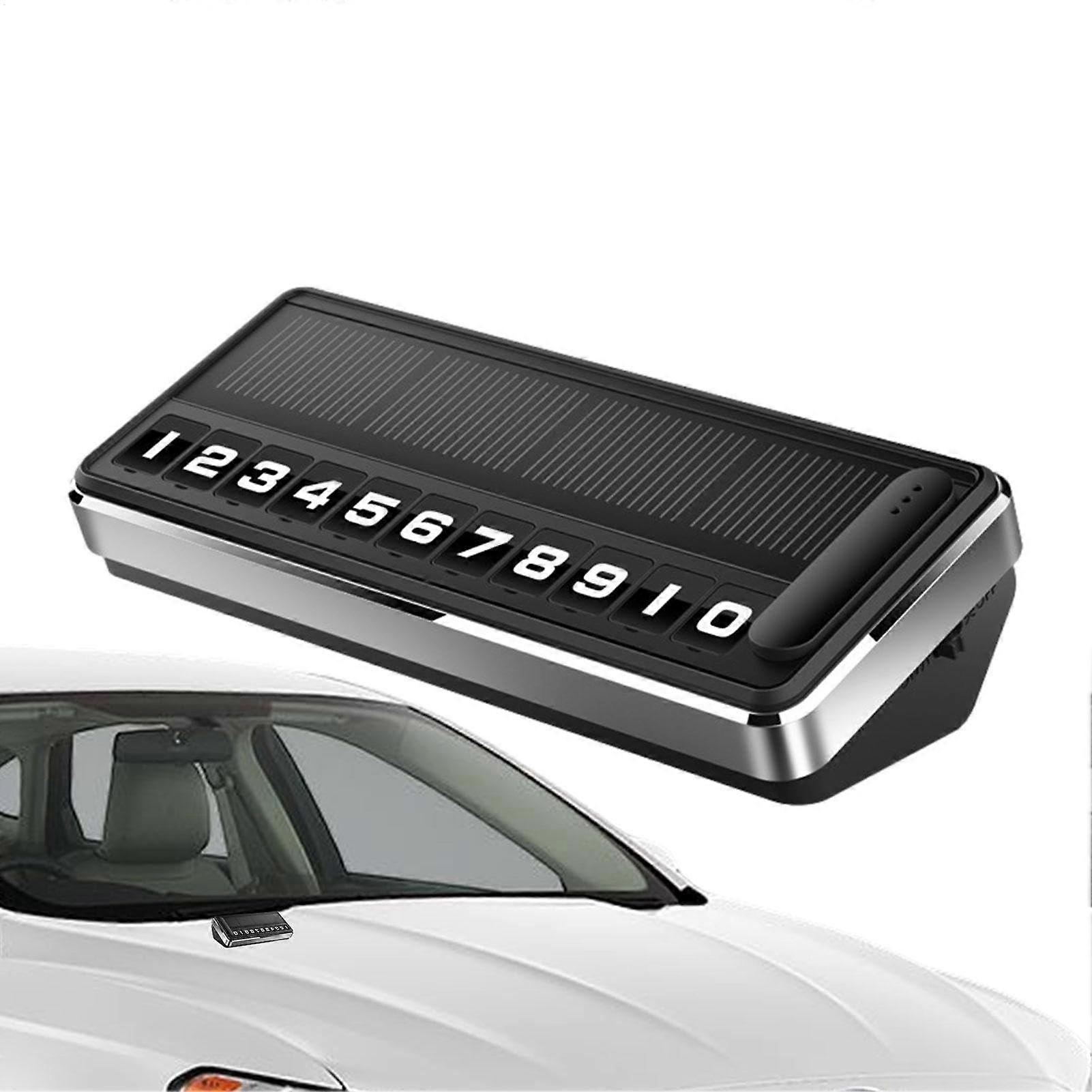 Auto license plate with phone number, temporary stop sign, phone number of moving car, interior accessories, phone number, ground charging phone