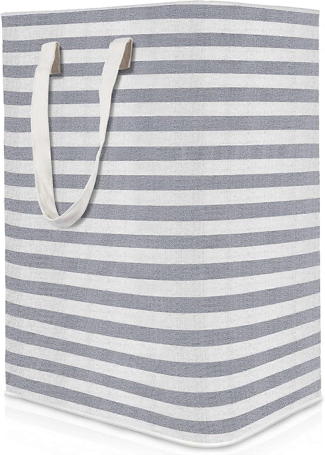 Freestanding laundry basket with extended reinforced handles, foldable