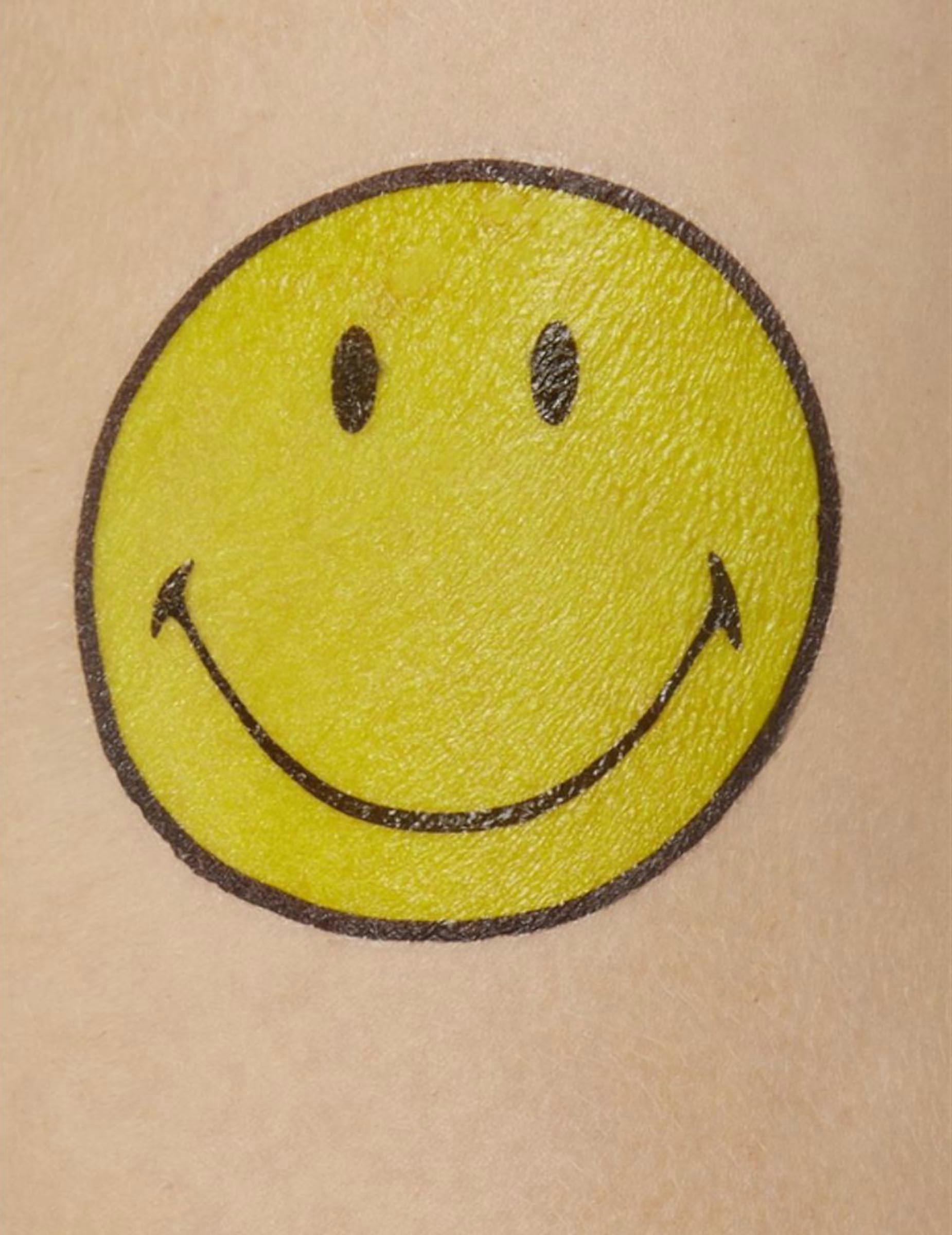 9 Multicolored Smiley Tattoos