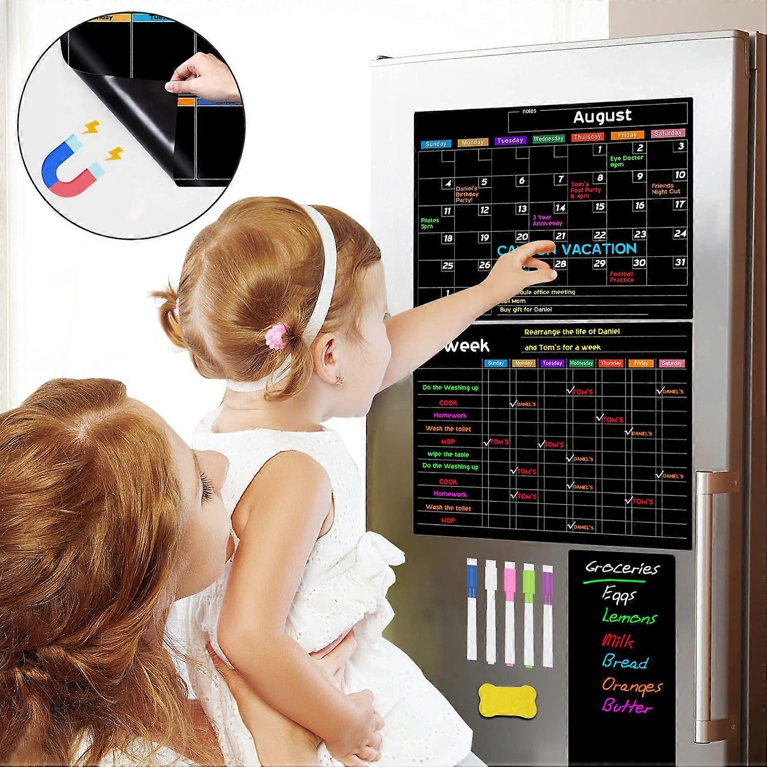 Magnetic board with stickers, pens, eraser for creative and organized workspace setup.