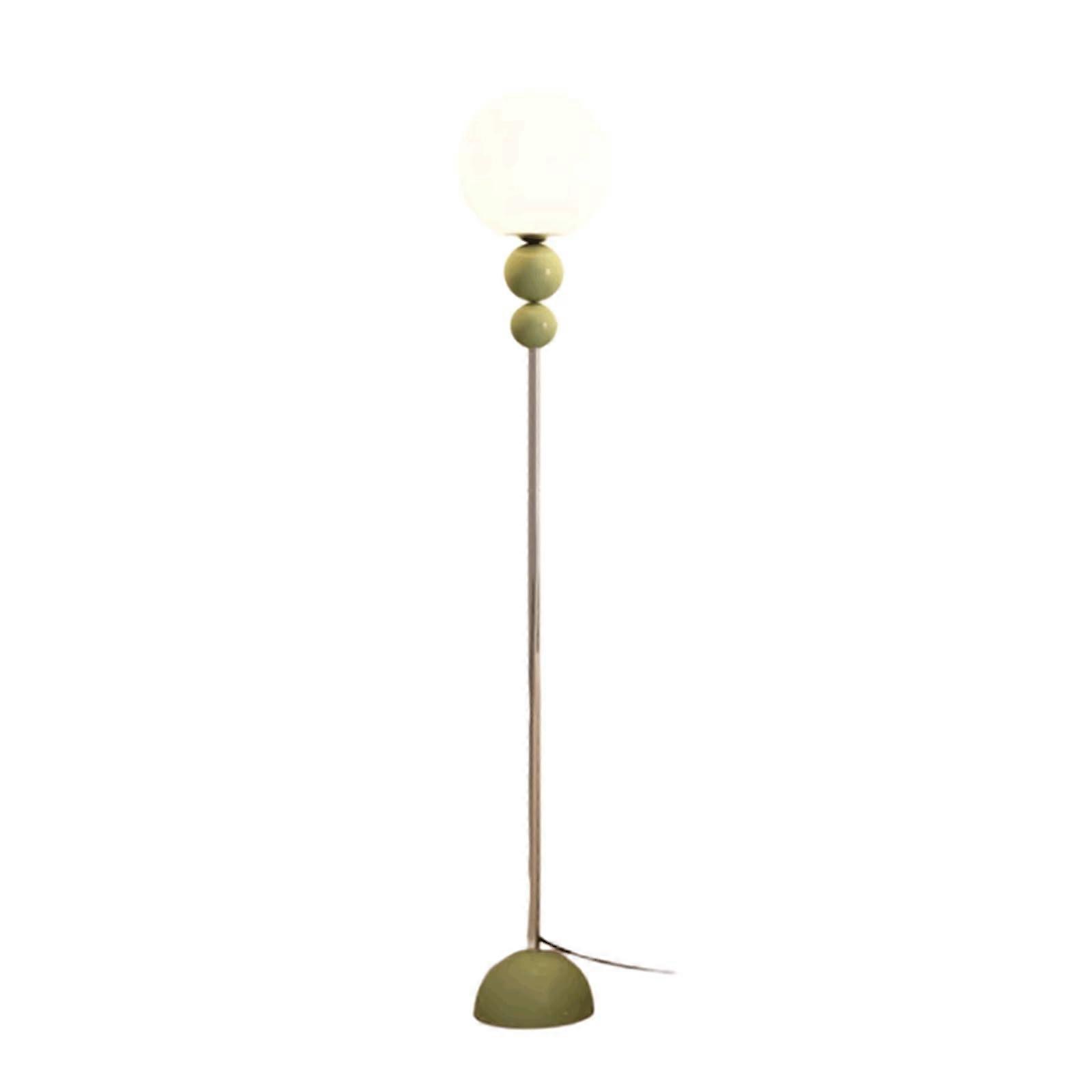 Stylish iron floor lamp lamp next to the sofa in the living room, dimmable floor lamp, creative plastic lampshade, Stöbe lamp, stable, green.