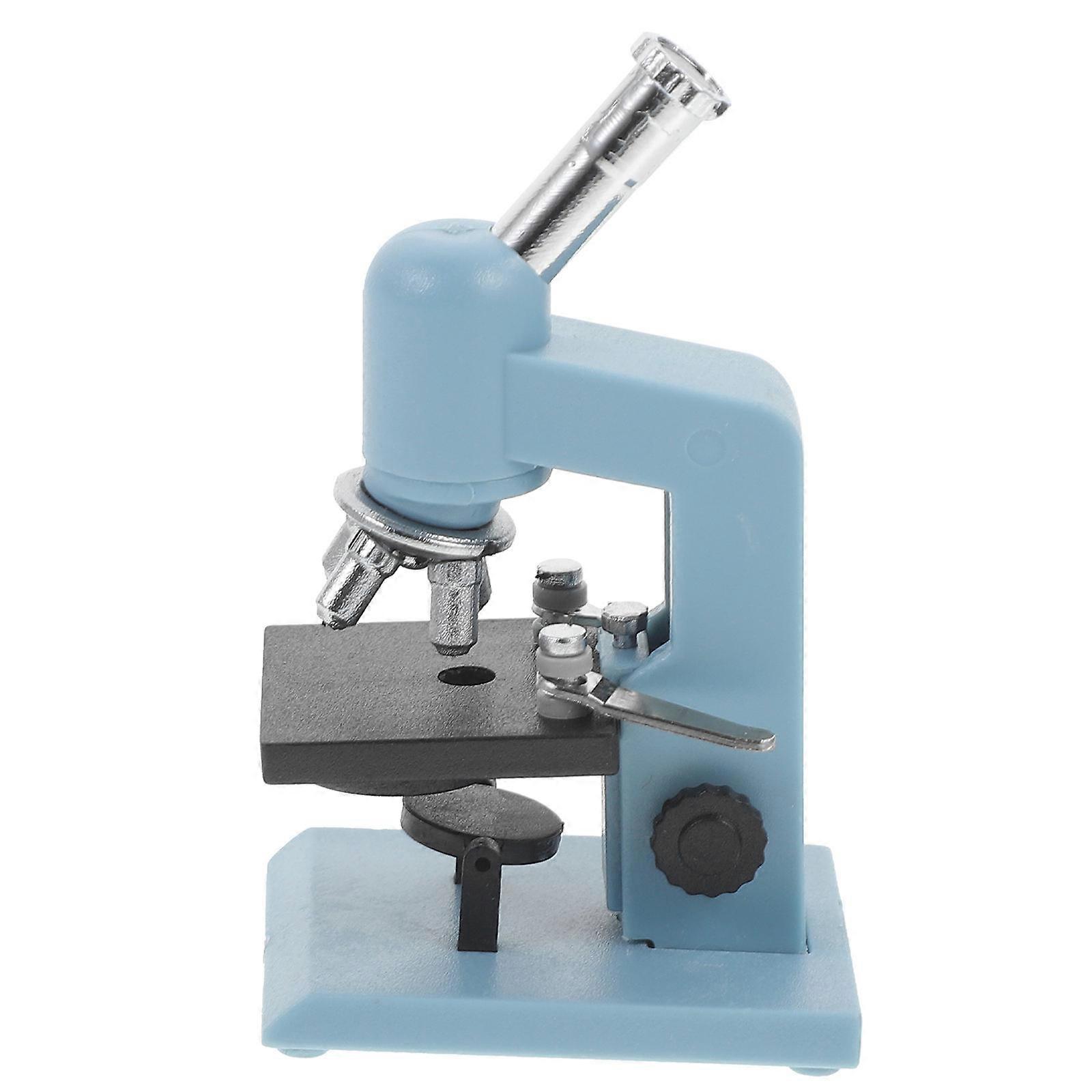 It sounds like you're describing a product listing or description for a **DIY miniature microscope model** intended for use as a **dollhouse