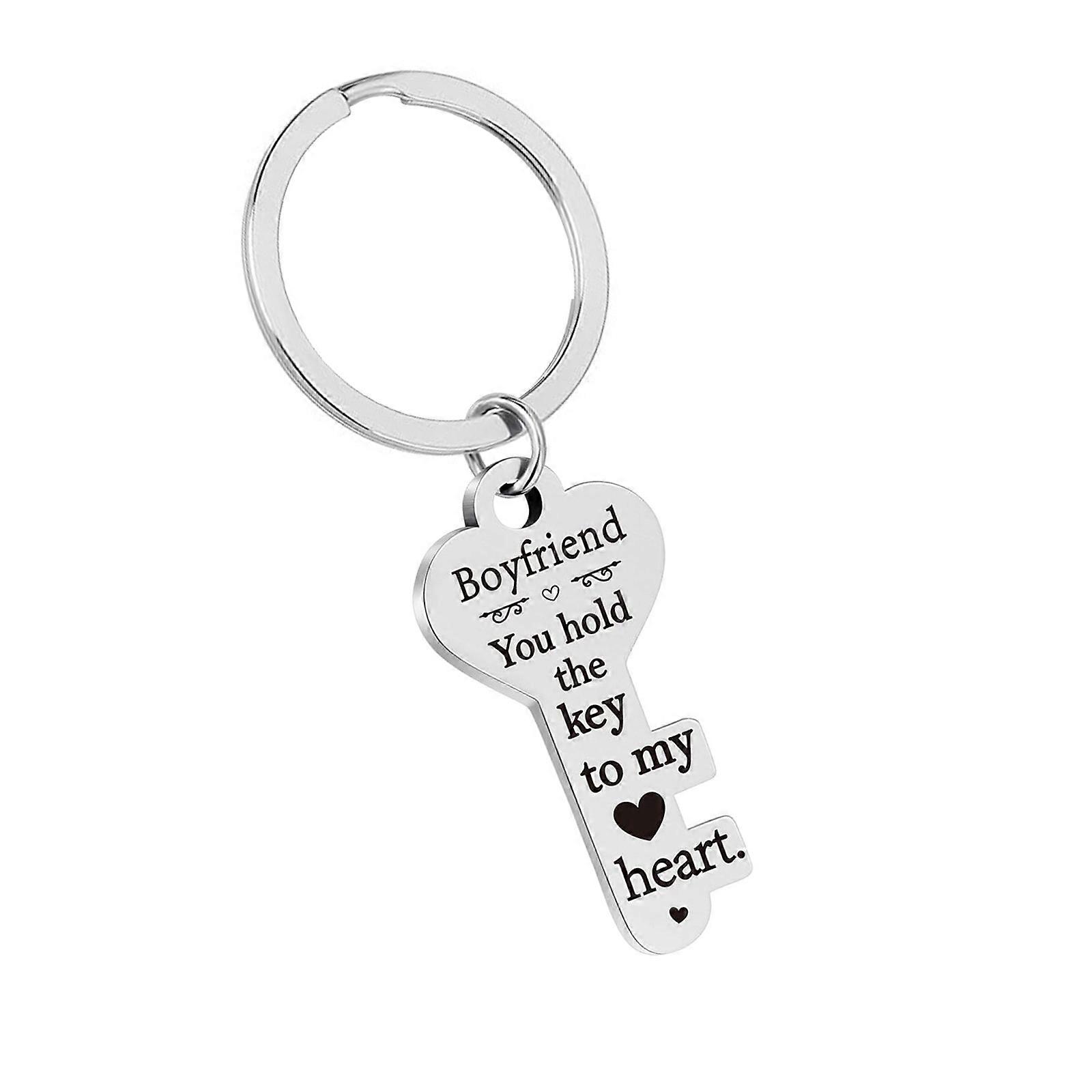 Sleek Key Shaped Key Ring Lightweight Construction Weatherproof Design Ideal for Commuters and Students Multicolor