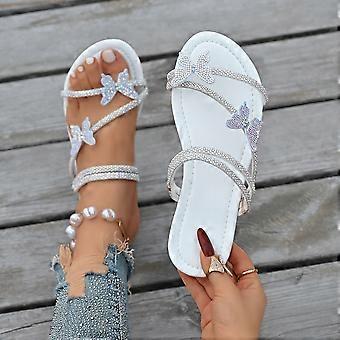 Flat-bottomed rhinestone butterfly open-toed slippers for women to wear 2026 summer new European and American fashion two-wear cool slippers