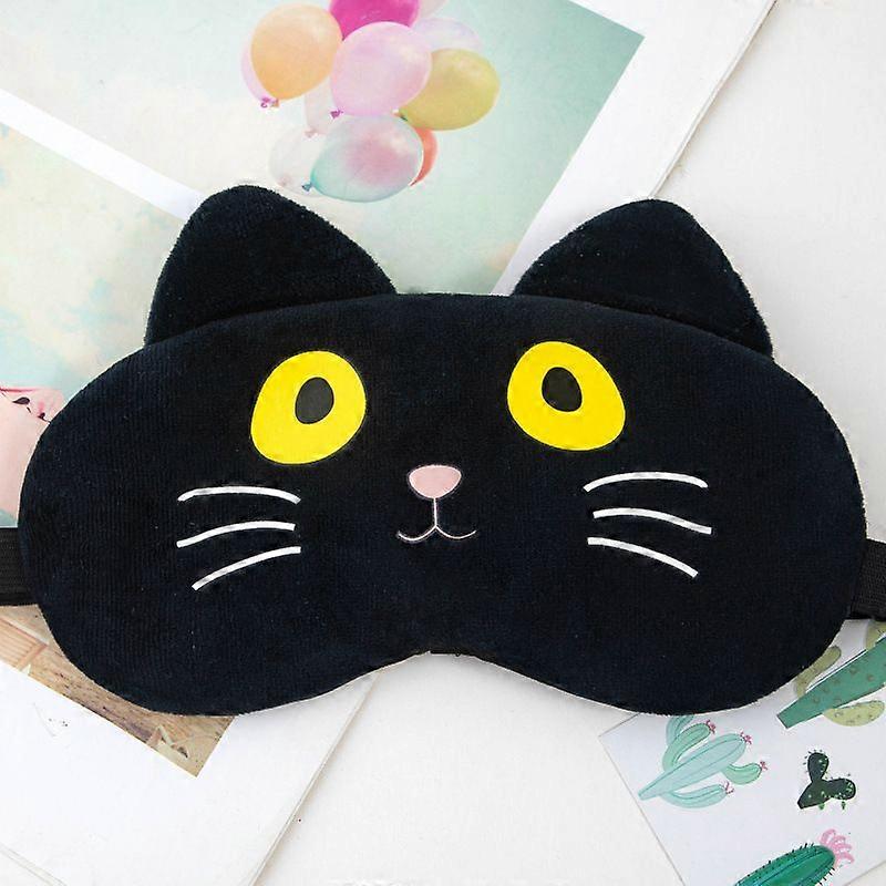 A sleep mask with a black kitten pattern