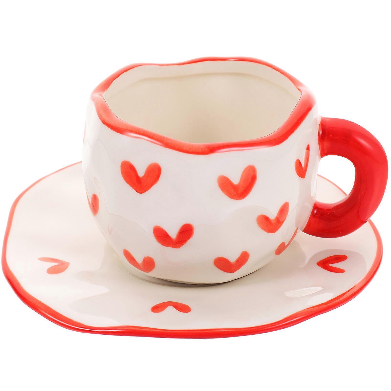 It sounds like you're describing or looking to write a product listing or description for a **hand painted ceramic coffee cup with saucer**, designed