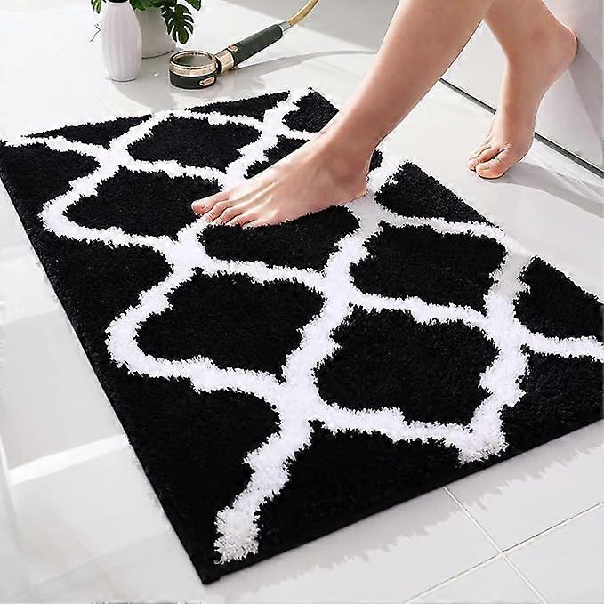 Non-slip, highly absorbent bathroom mat with a Moroccan pattern