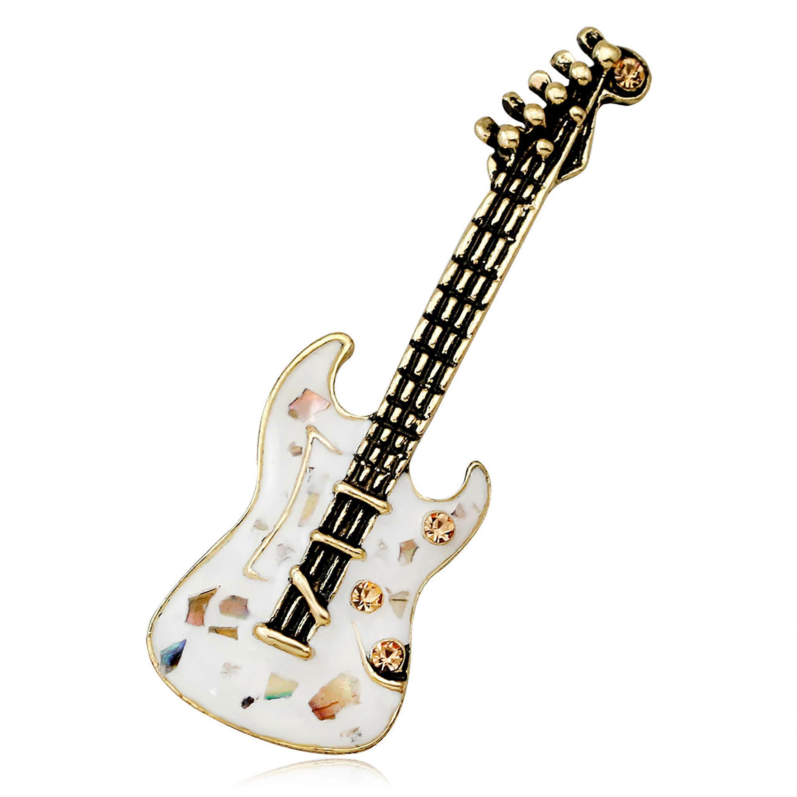 Vintage crystal musical instrument brooch, trombone and drum design