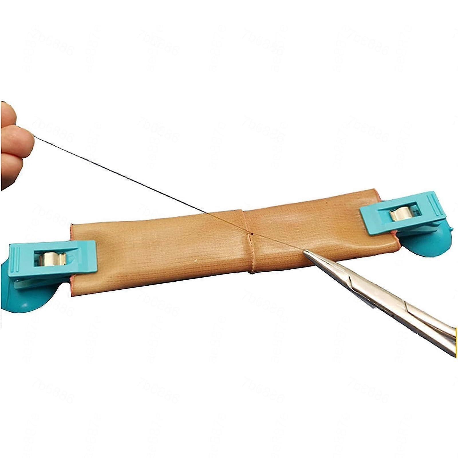 Reusable Laparoscopic Suturing Training Model with Anatomically Accurate Intestinal Anastomosis Simulator