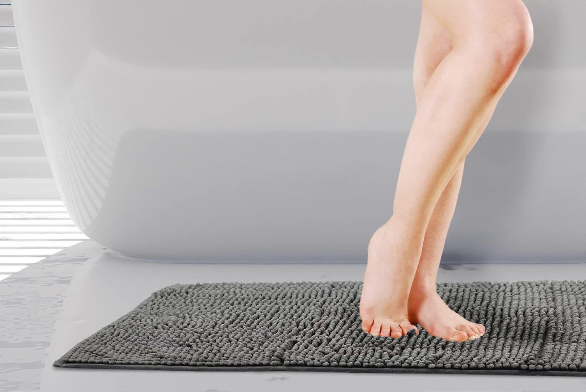 Soft, non-slip, machine washable, fluffy, shaggy bath mat.