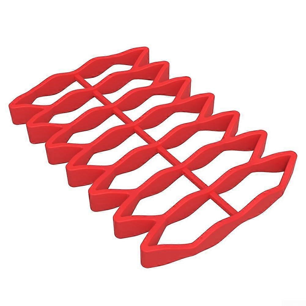 Reliable support with our silicone cooling racks  elevates above fats and liquids (red).'