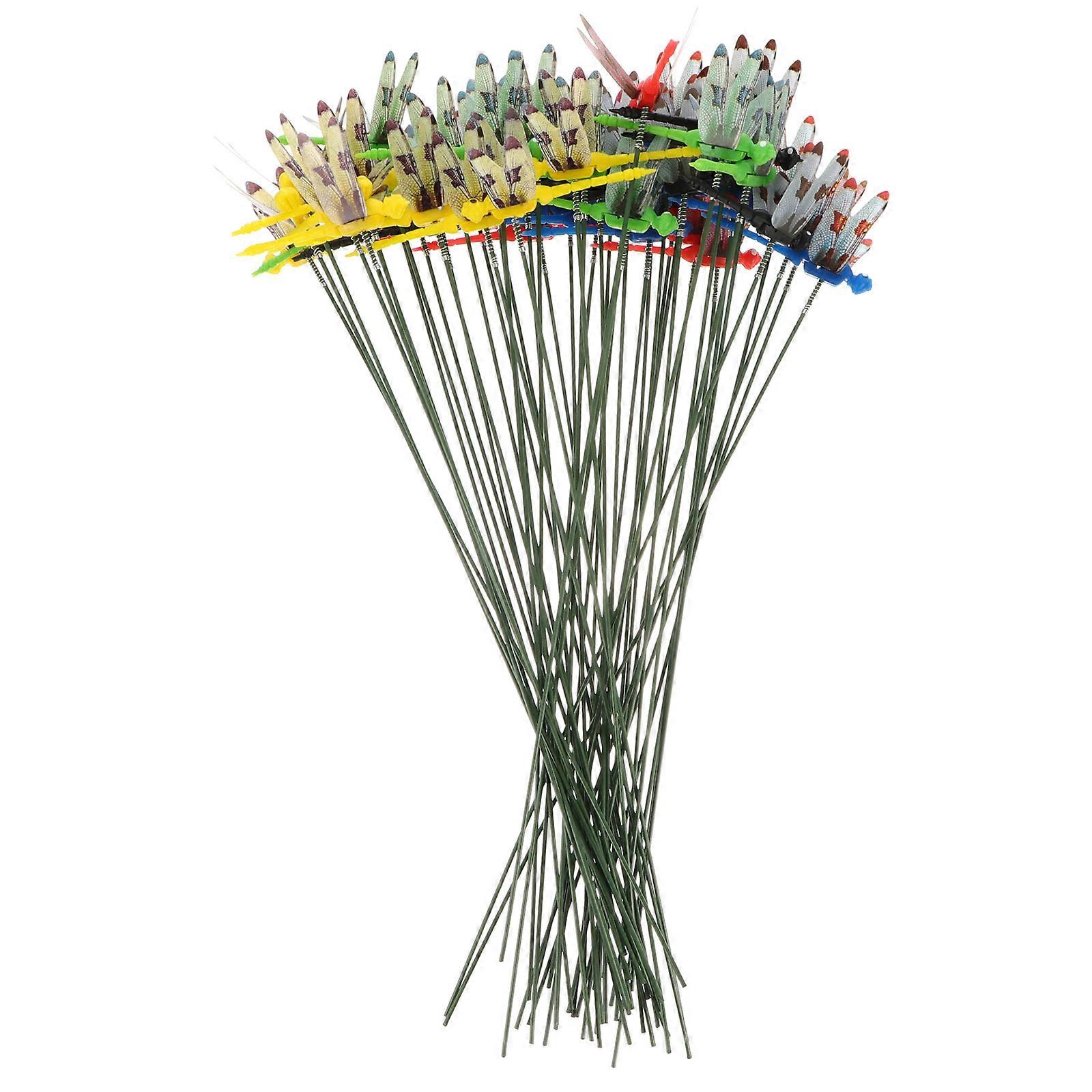 Nature-Inspired Dragonfly Stakes Complementing Plants and Flowers
