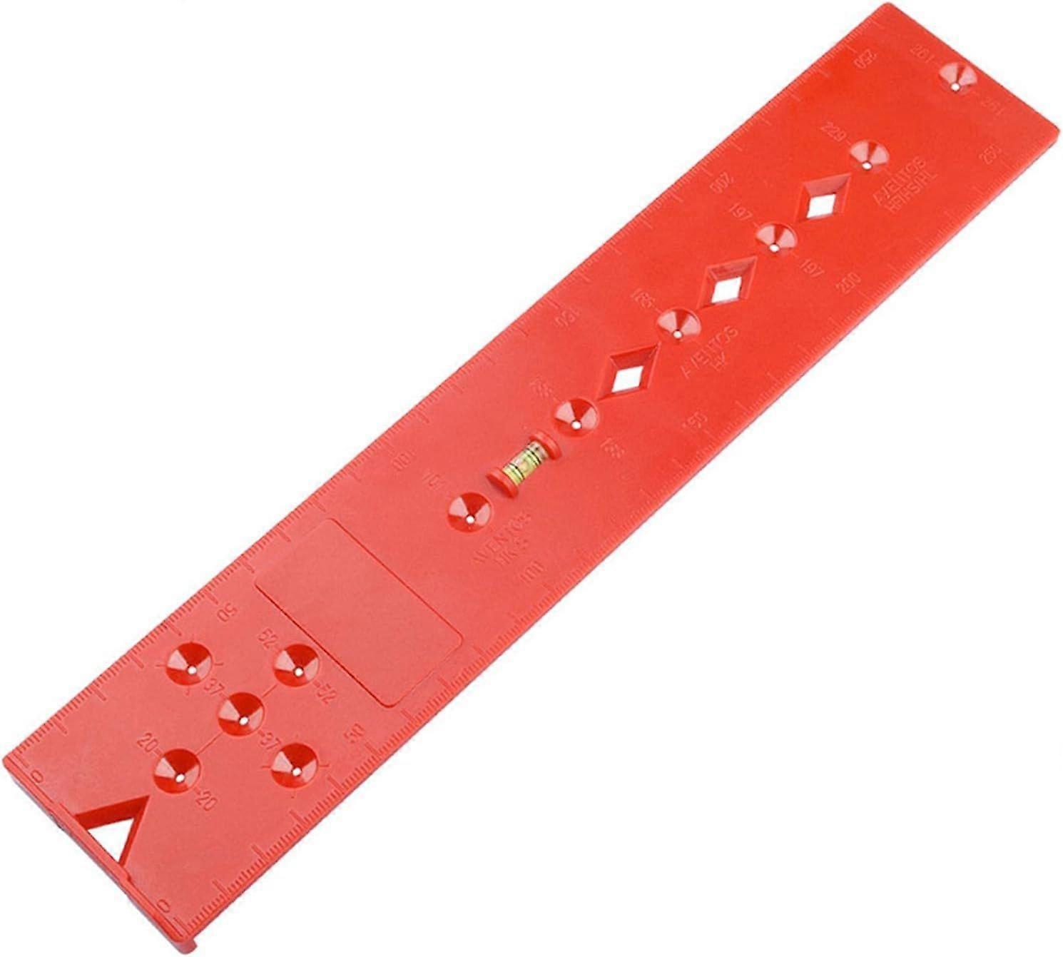 Red woodworking drill locator