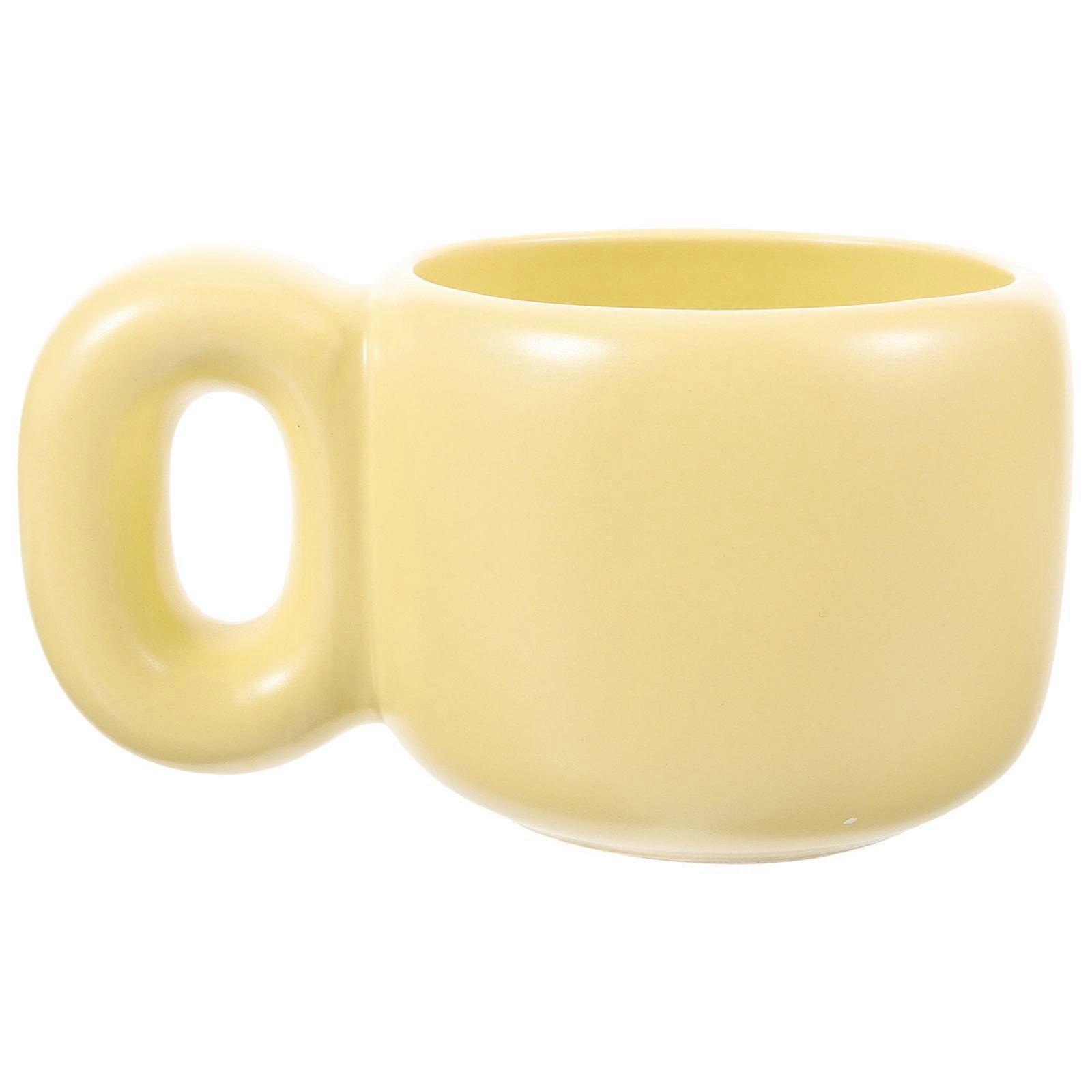 Here's a refined and appealing product title and description for your **Coffee Mug**:
### **Product Title:**
**Nordic Style Chunky Handle
