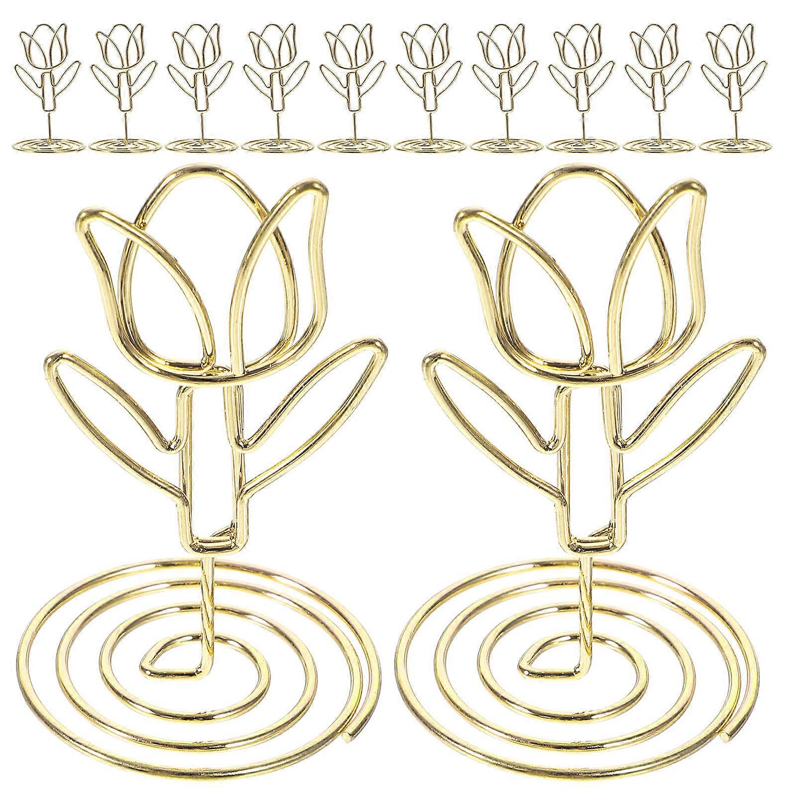 a polished product description based on the details you provided:
**10pcs Tulip Shaped Metal Memo Clip Holders – Elegant Gold Wedding Table
